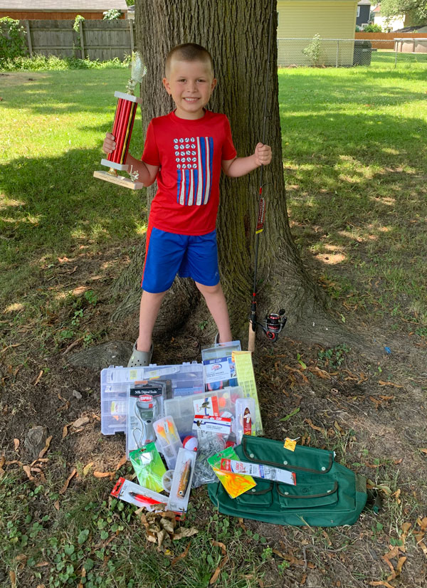 Ed Mort shows off his prizes