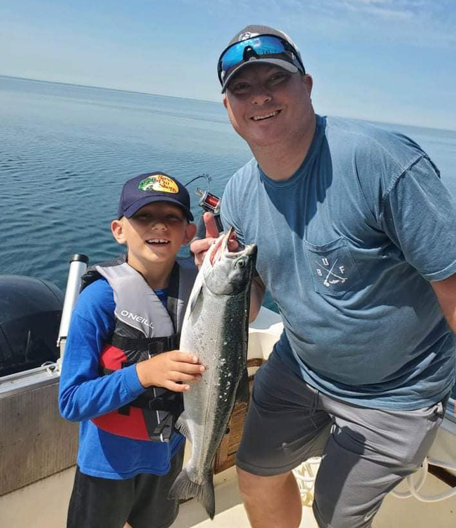 Charlie Brittain and son Dawson coho salmon