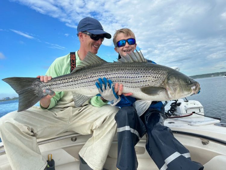James and Aaron Garland striped bass