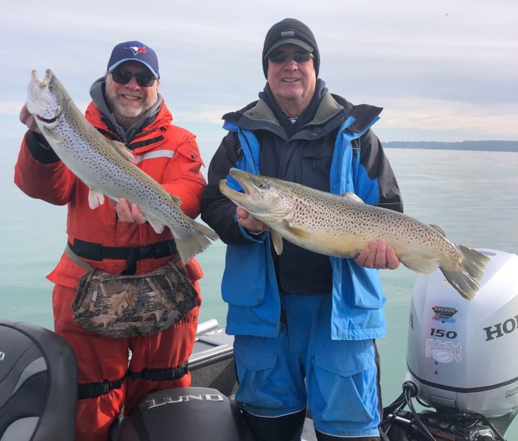 Gary Laidman and Steve Haak with pair of brown trout