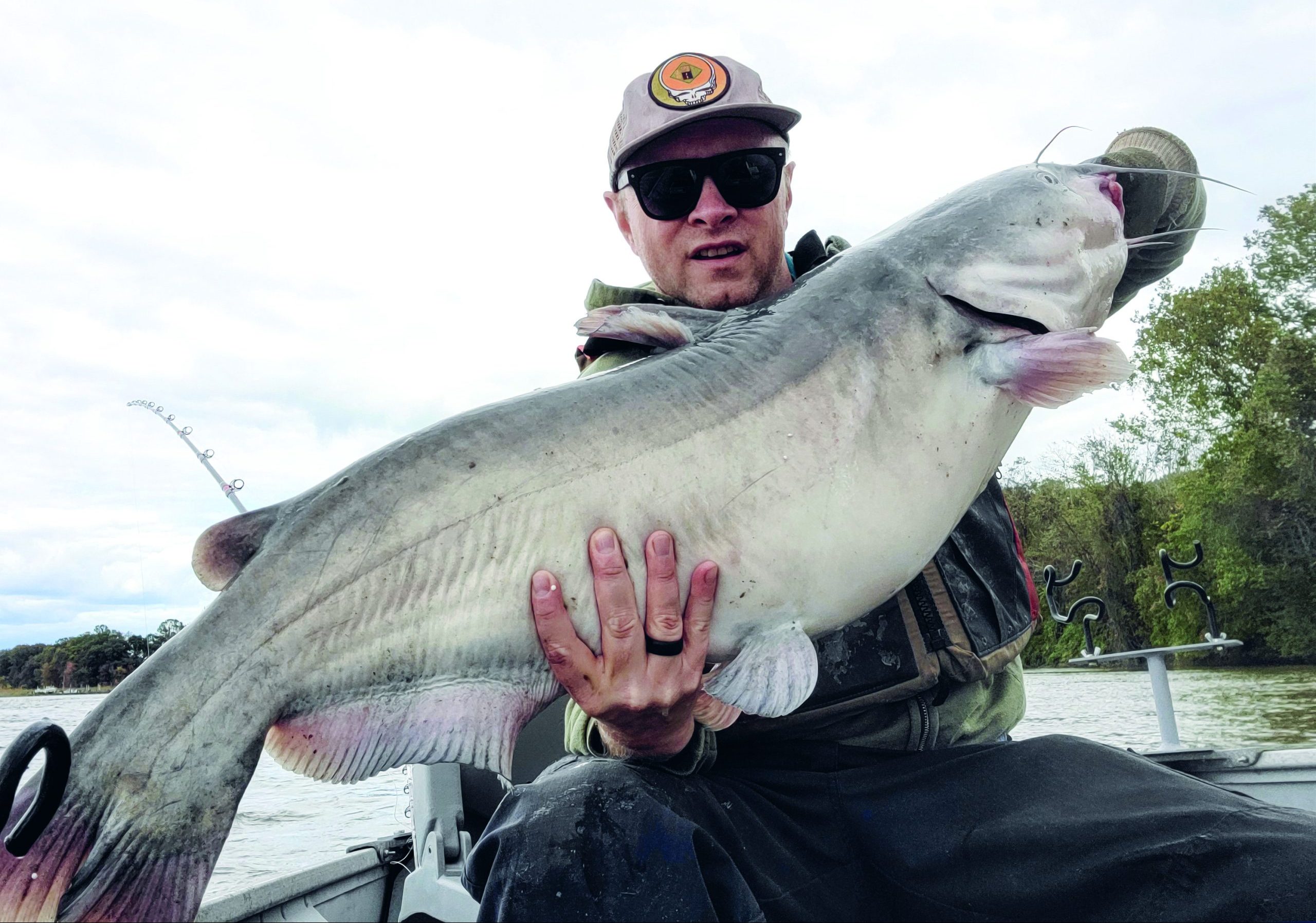 Fly fish angler reels in potential world-record blue catfish in