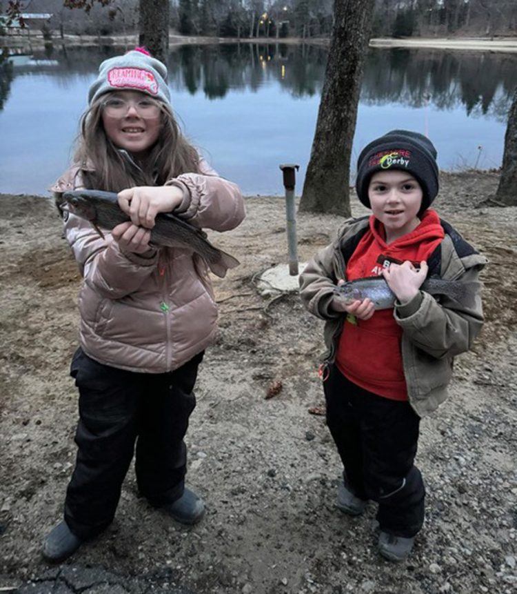 Elise and Griffin Sabolevski with trout