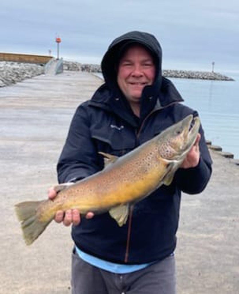 Vic Thibault with a brown trout
