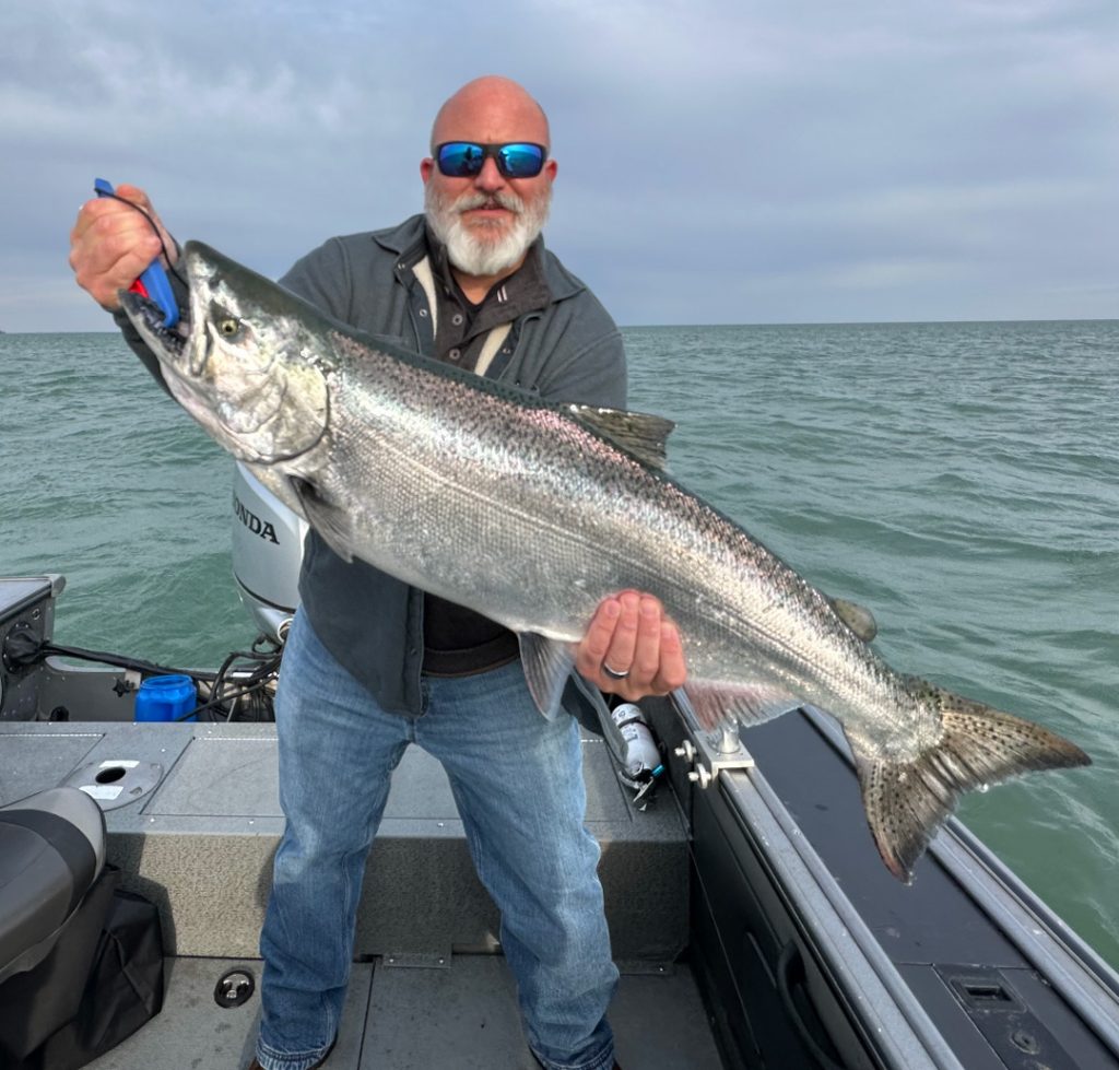 Josh Gates with king salmon