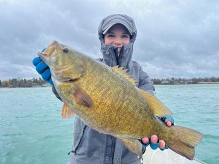 Laura Plunkett with PB smallmouth bass