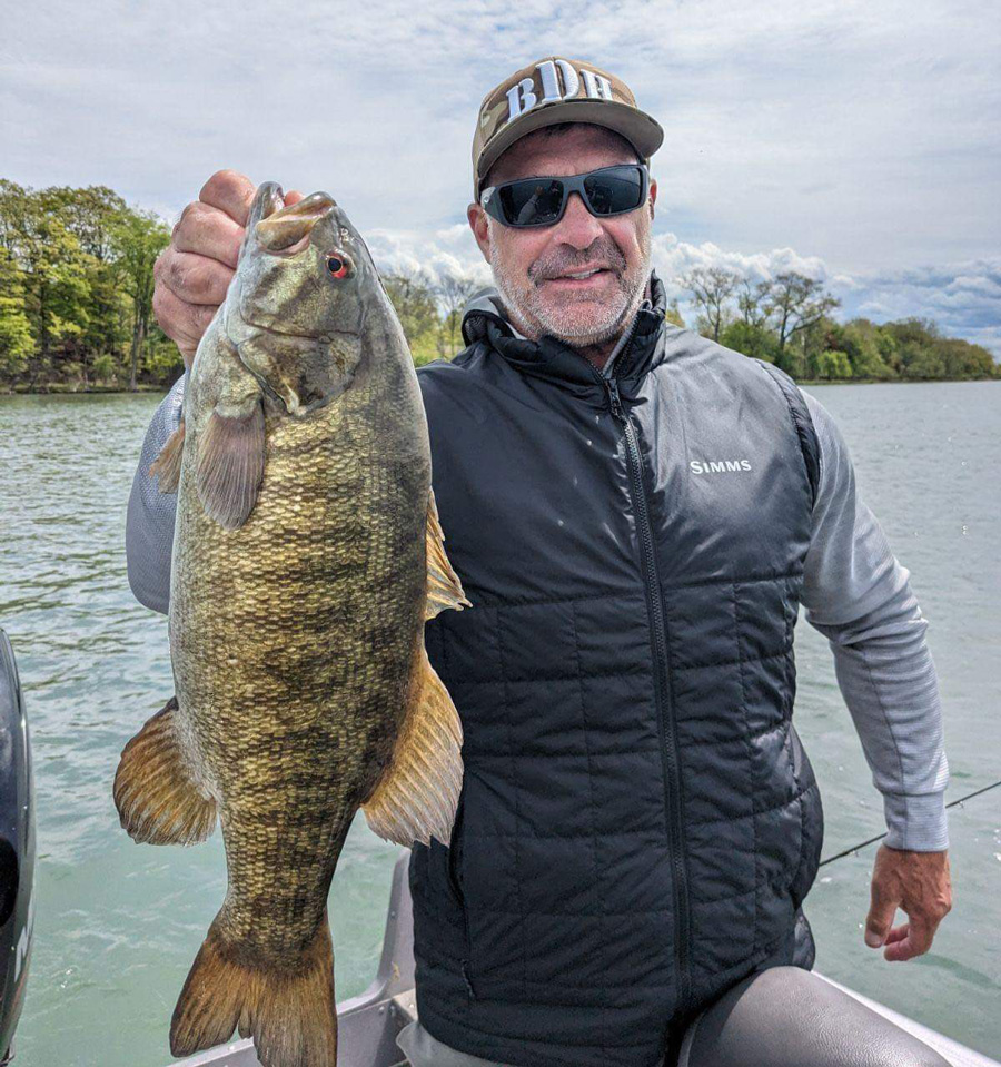 David May with smallmouth bass