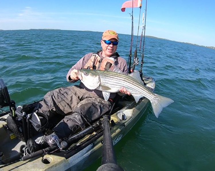 Tommy O’Brien with striped bass