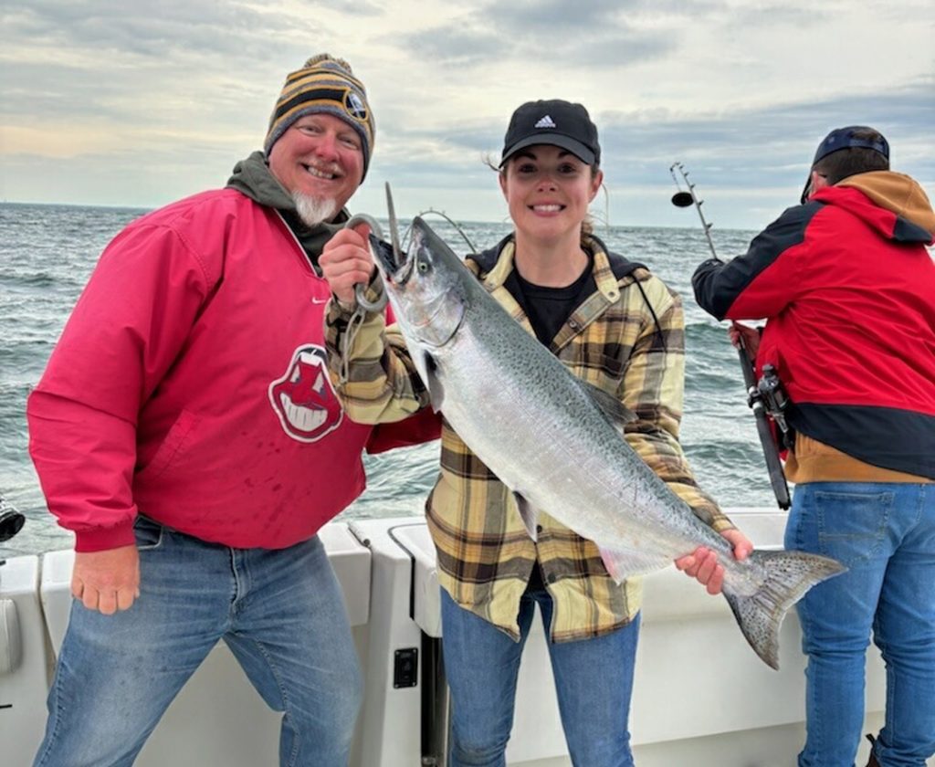 Kelly P hefts a nice King aboard Sunrise II
