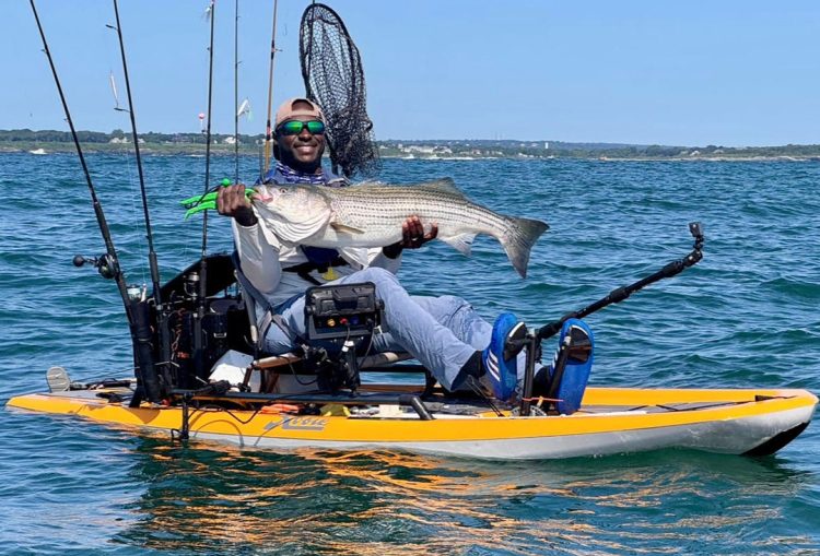 Dustin at RI Kayak Fishing Adventures striped bass