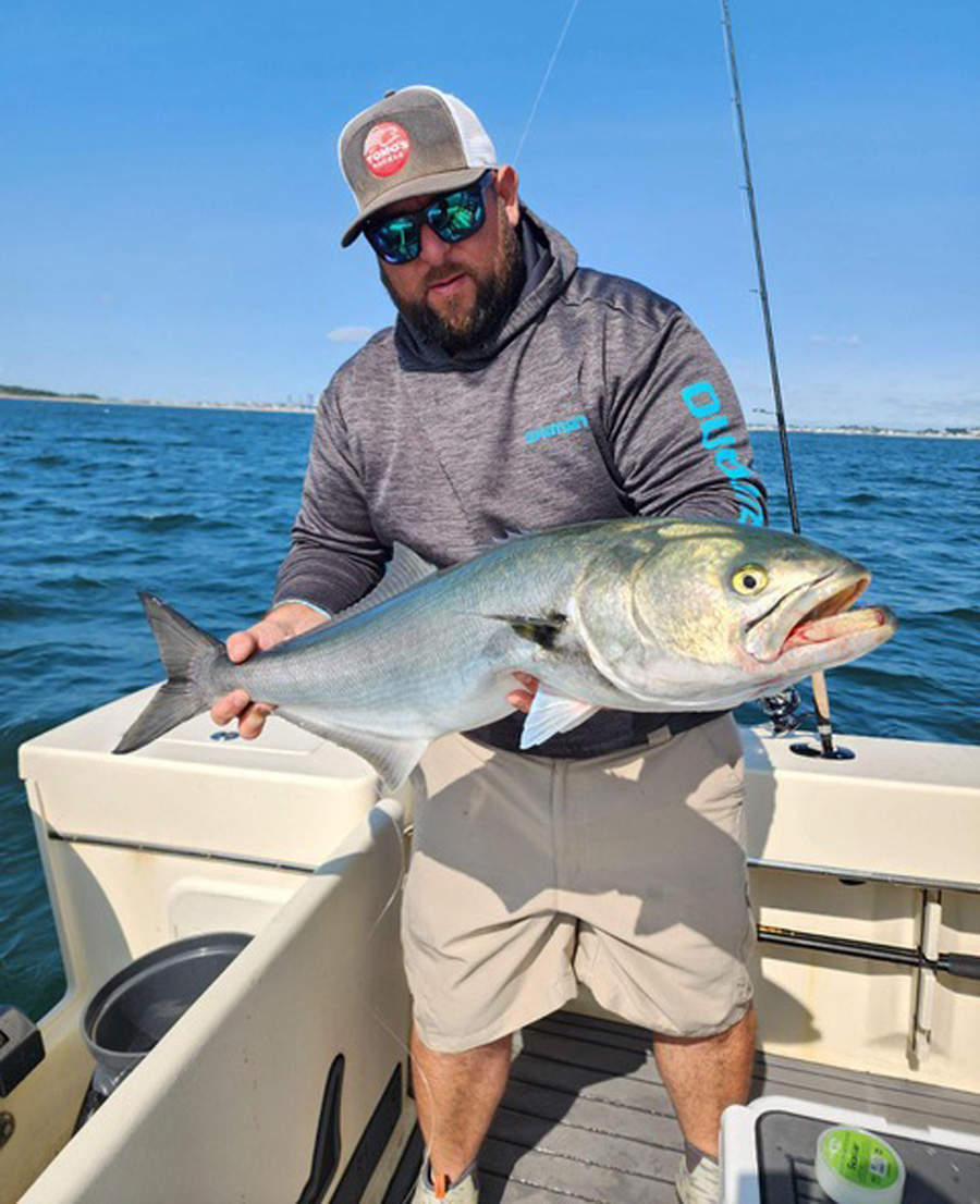 Captain Brian Coombs with bluefish