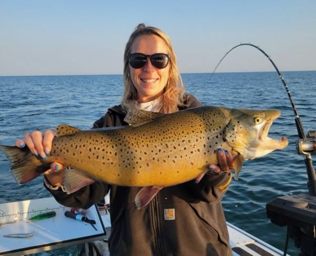 Paige from Rippin Lipps with brown trout