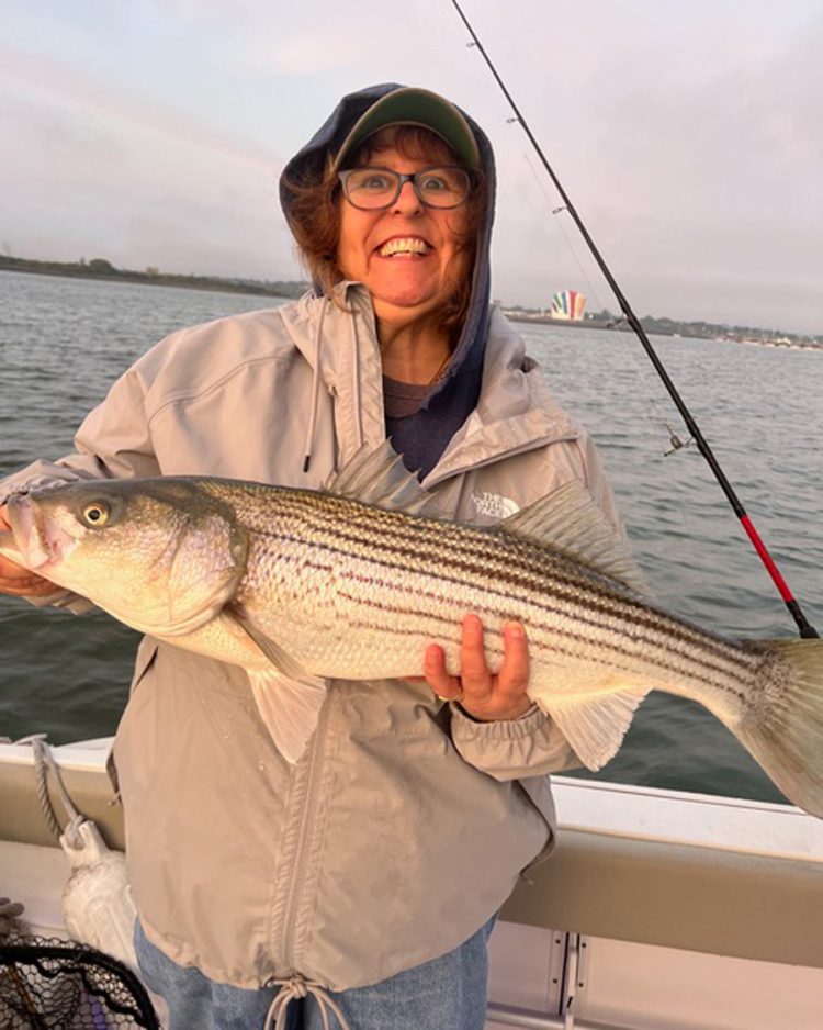 Lisa from Fore River with striped bass