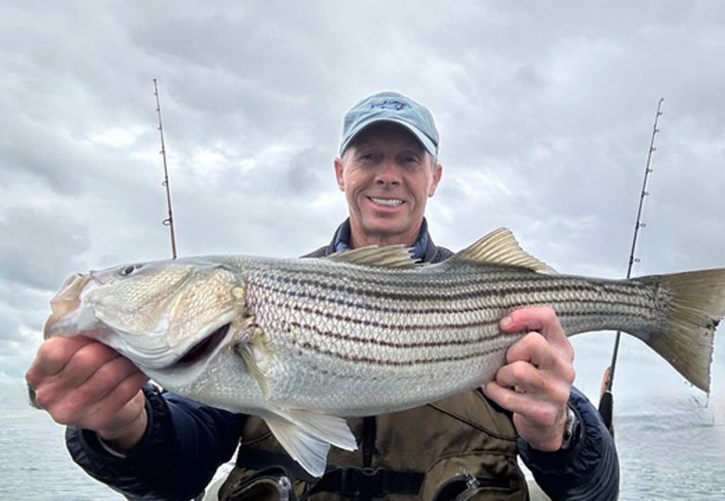Steve Langton with striped bass