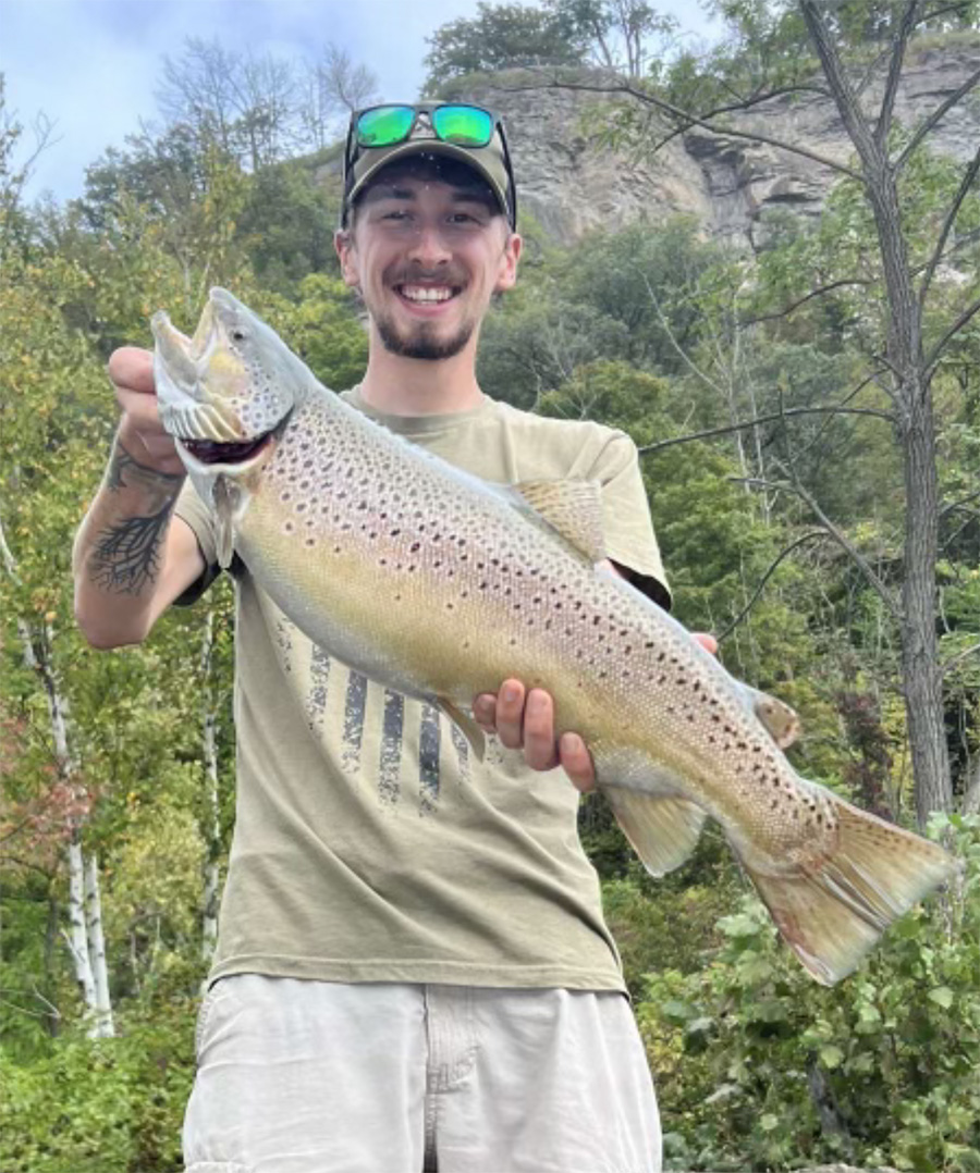 Parker Cinelli with brown trout