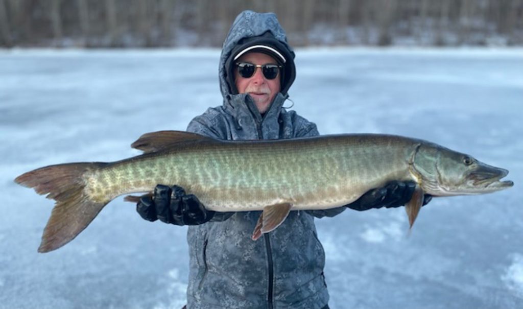 Dan Southwick with tiger musky