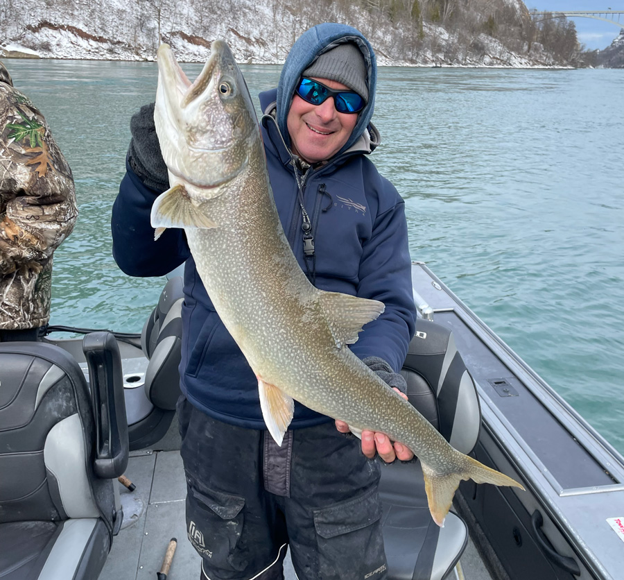 Capt. Chris Cinelli with lake trout