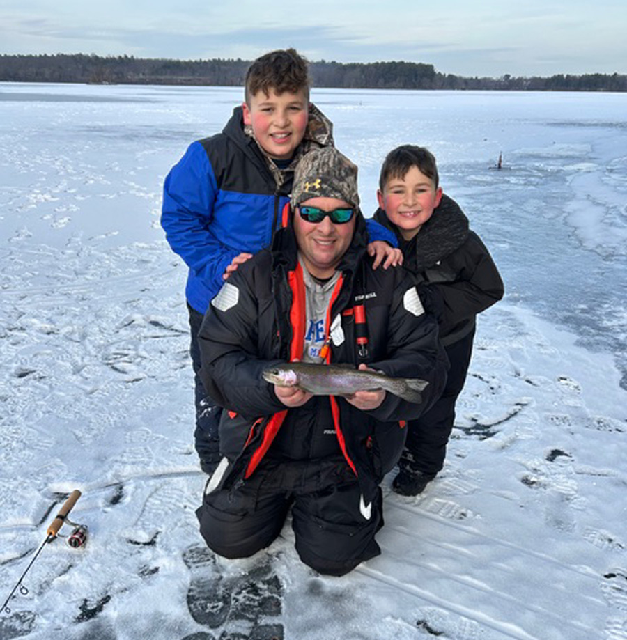 Paone family with rainbow trout