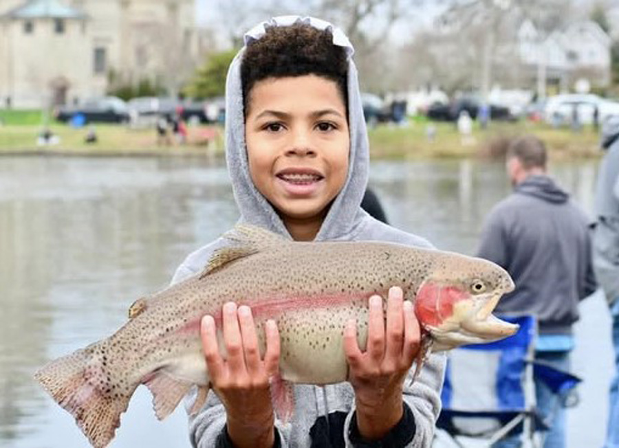 Doug Apsley with winning 7 pound, 4 ounce rainbow