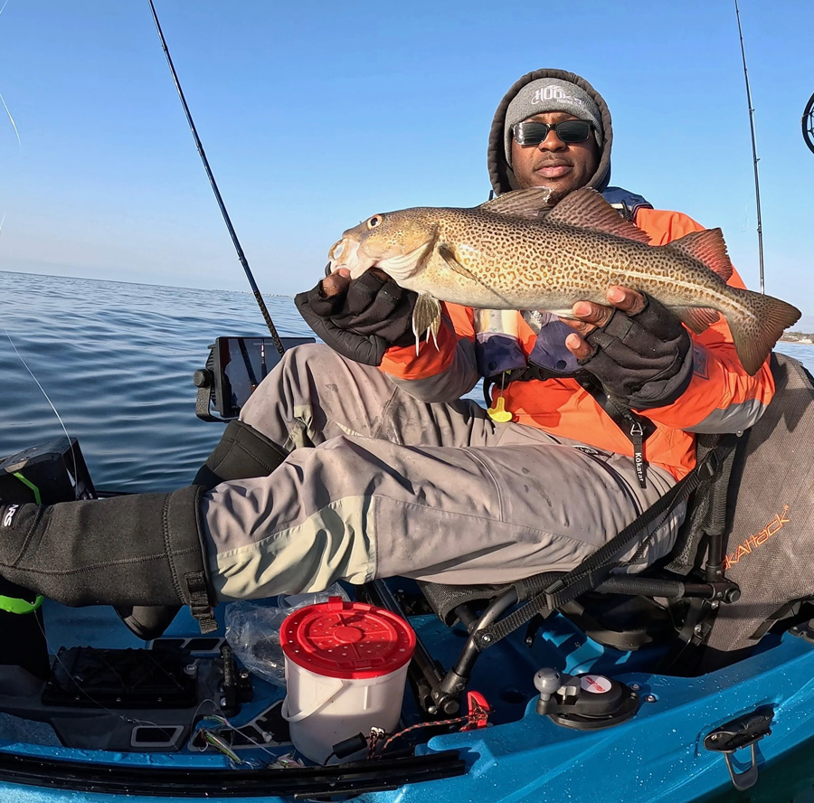 Dustin of RI Kayak Fishing Adventures with a nice kayak cod