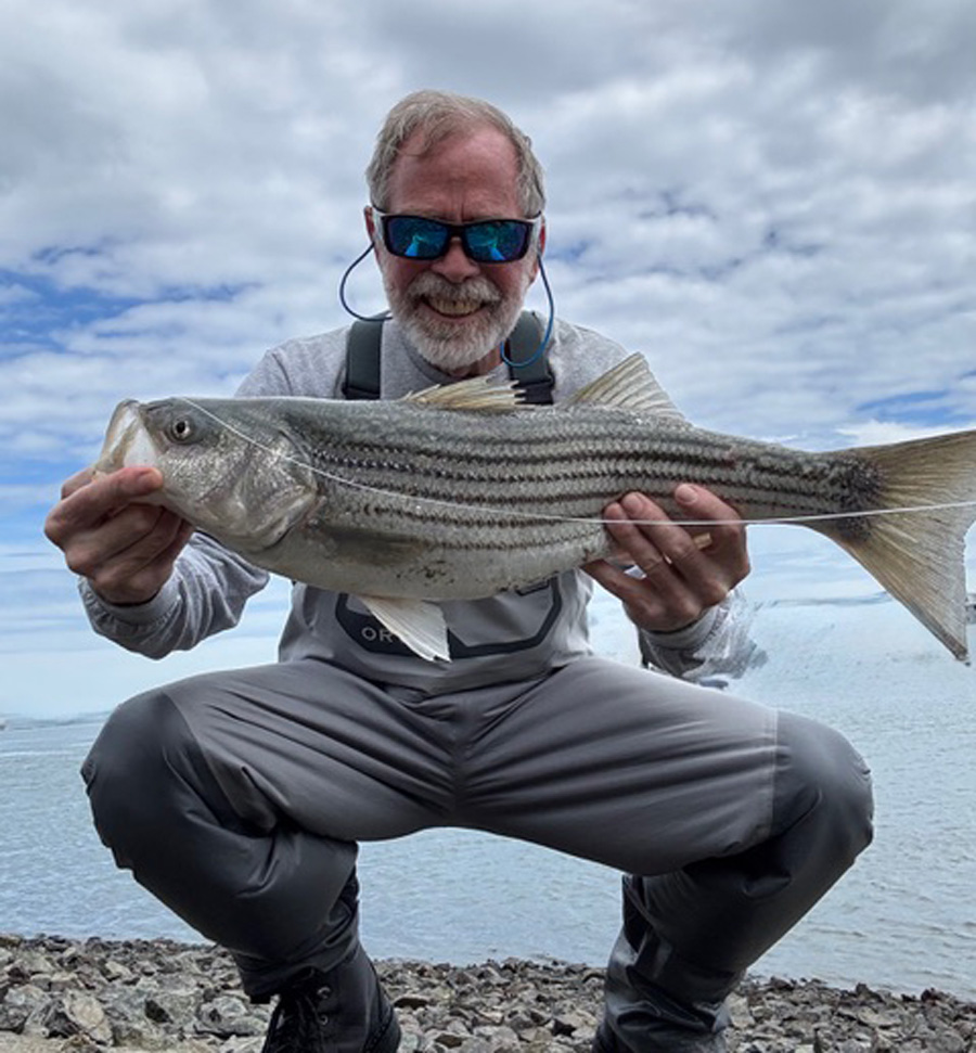 Dave &ldquo;The Dude&rdquo; Flaherty with striped bass