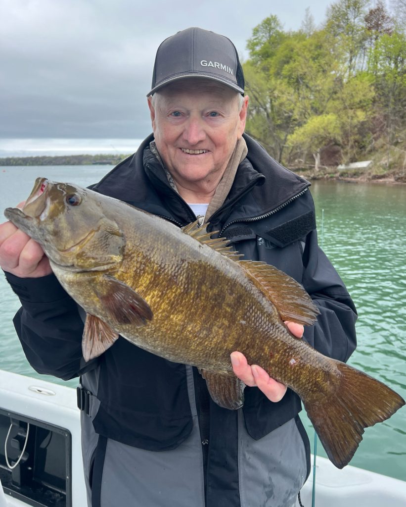 Mark McQuown with smallmouth bass