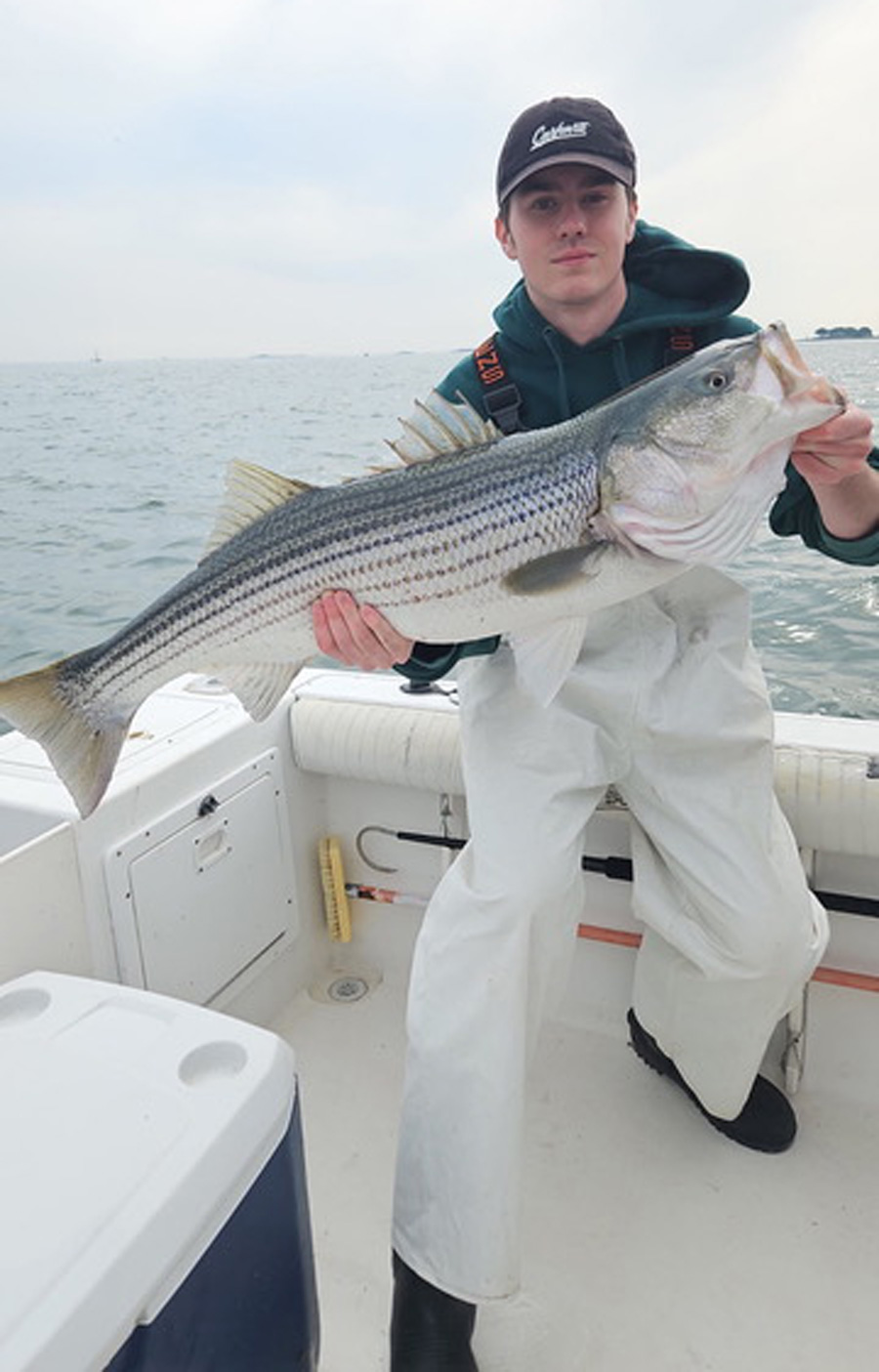 Aidan Rock with striped bass