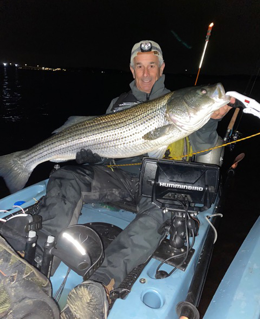 Marco Cicerano with striped bass