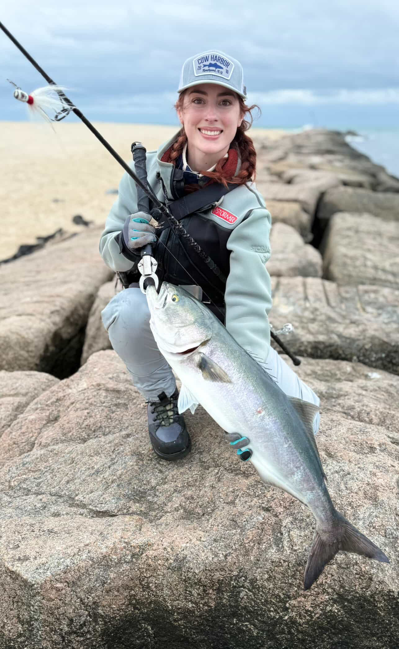 Amanda Jensen with a jetty bluefish on Long Island