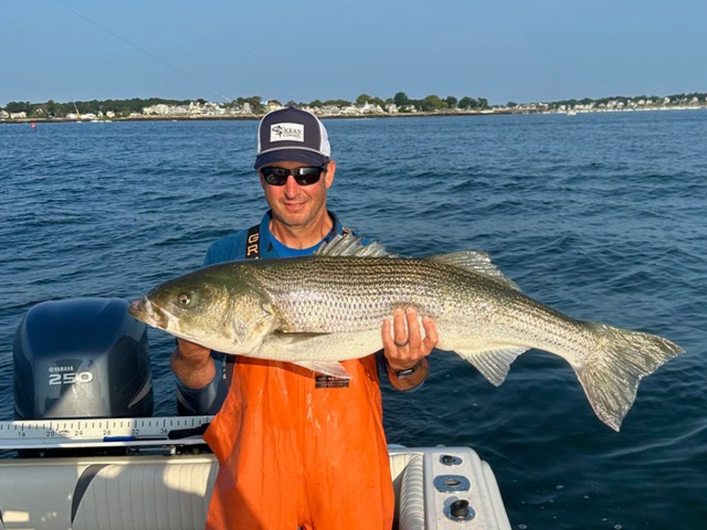 Pete Decarolis with striped bass