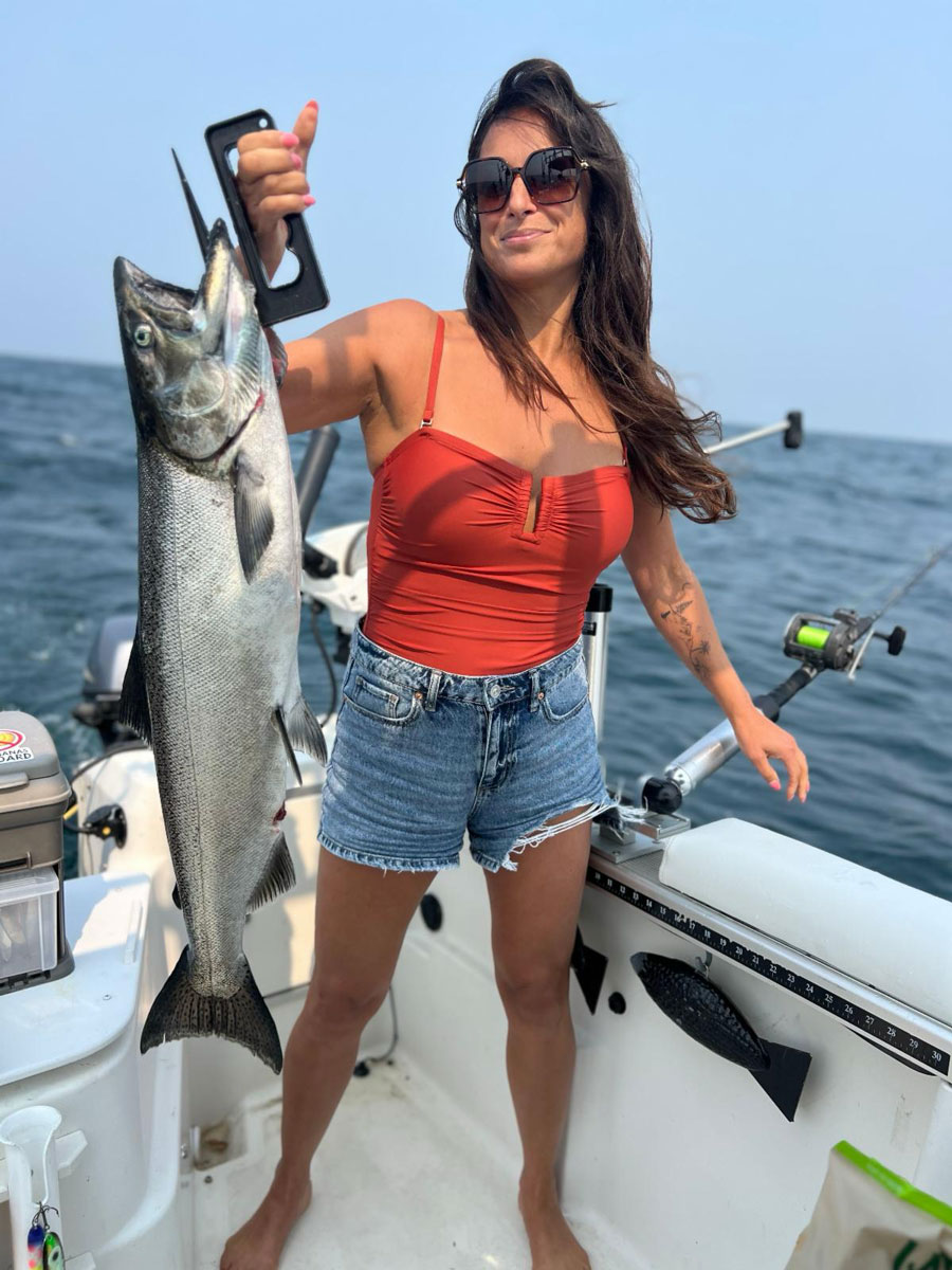 Theresa hefts a nice king salmon