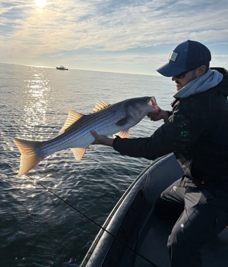 Jay Dutremble with striped bass