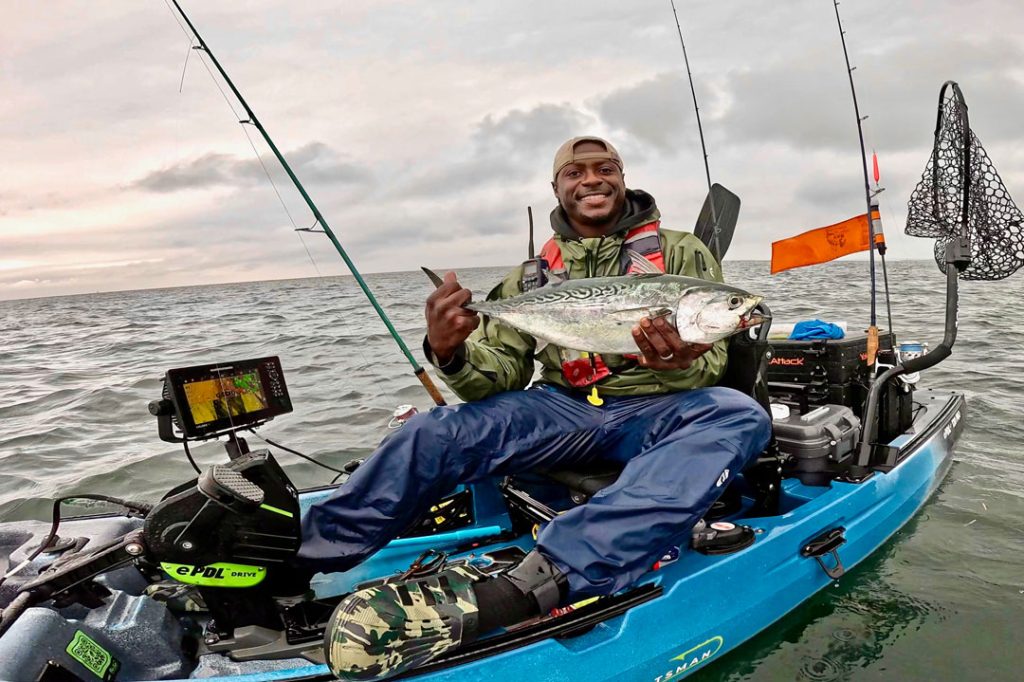 Dustin of RI Kayak Fishing Adventures with albie