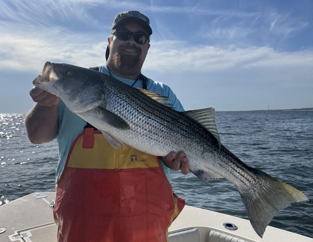 Dan Staal with striped bass