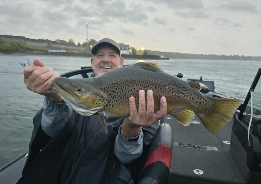 Sam Gray with brown trout