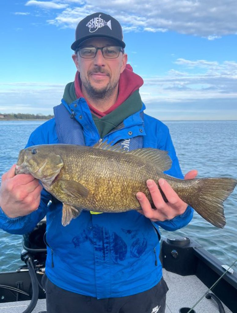 Justin Narchus with smallmouth bass