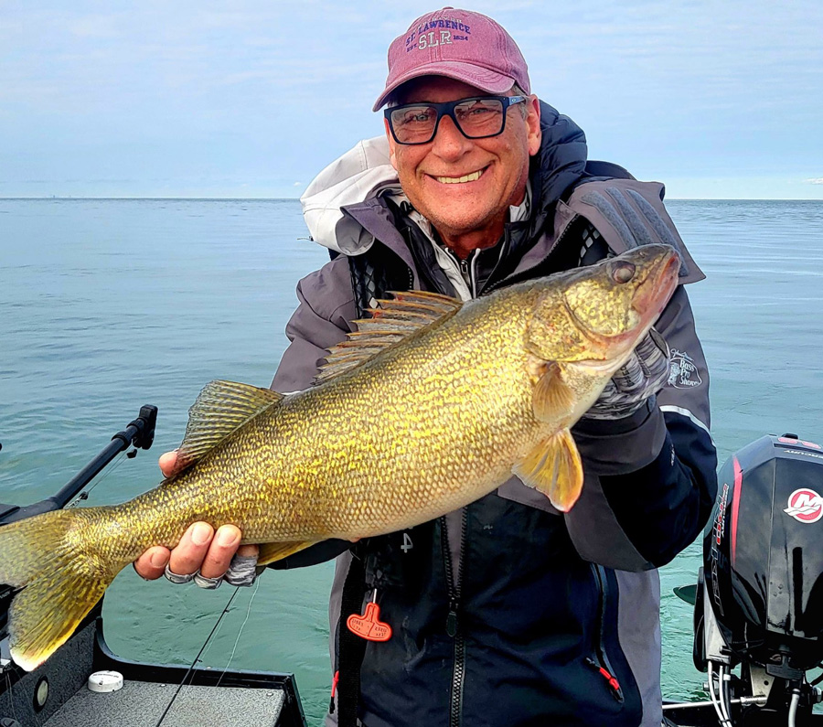 Mark Mika with walleye