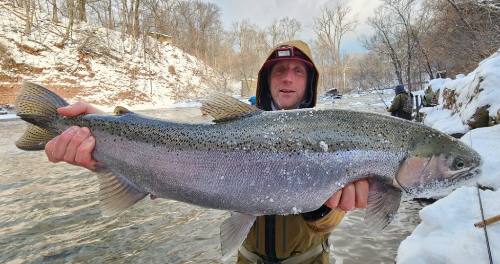 Mark Musser with steelhead in the snow