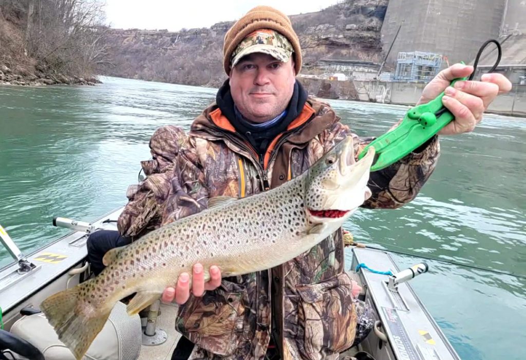 Joseph Drzal with brown trout 