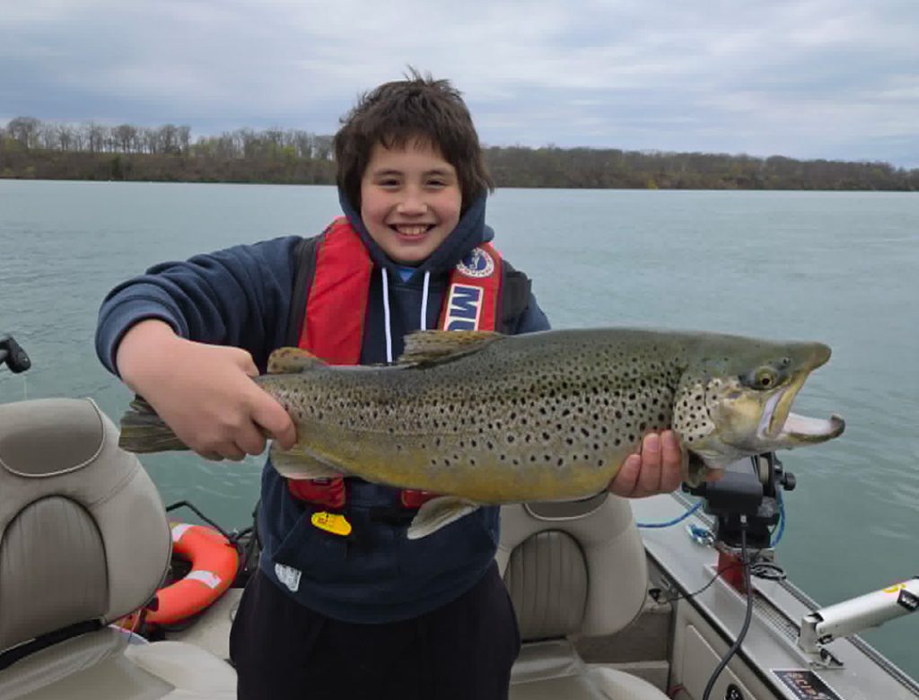 Elliot Chin with brown trout