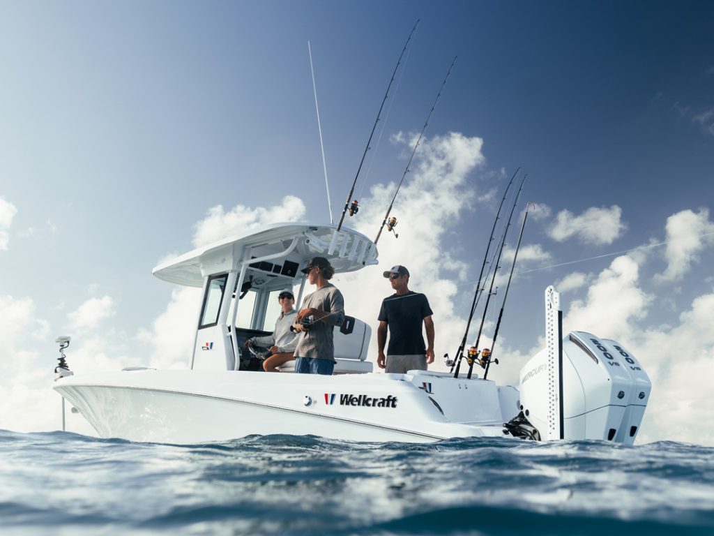 anglers fishing aboard a Wellcraft 243 Fisherman