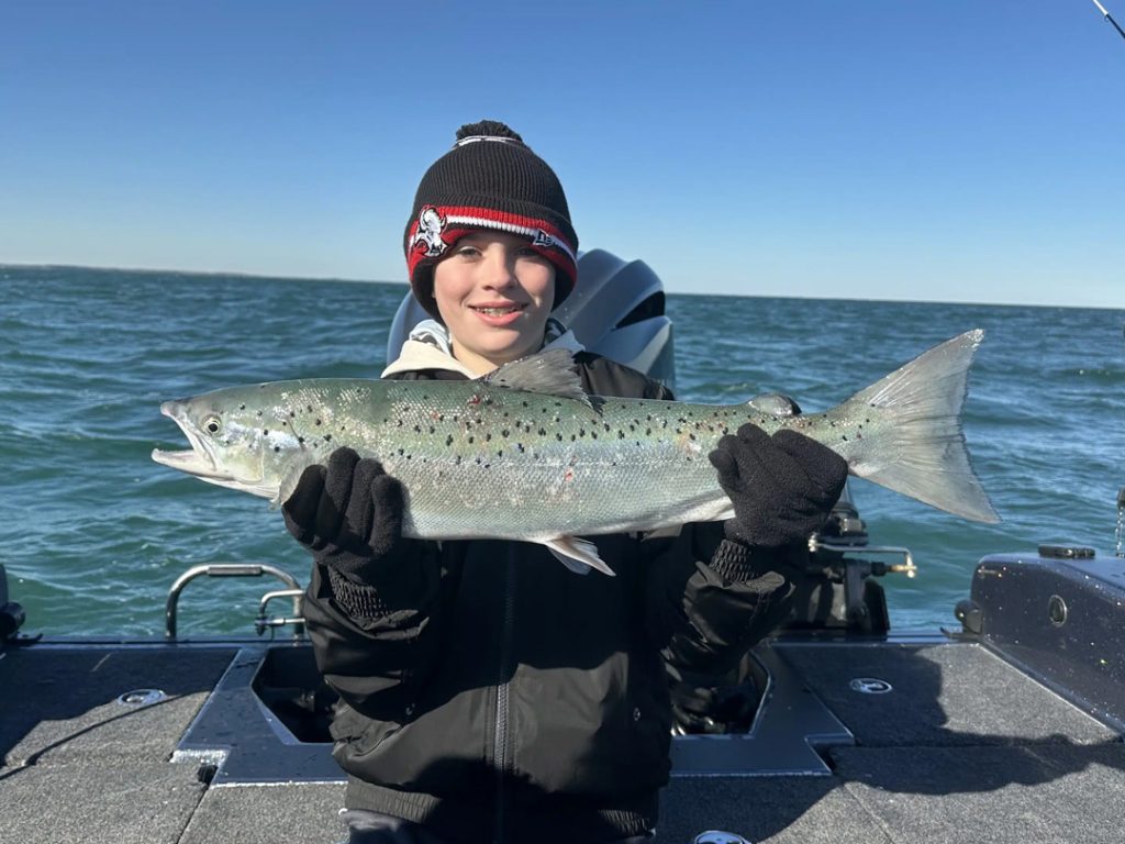 Lincoln Endres with Atlantic salmon