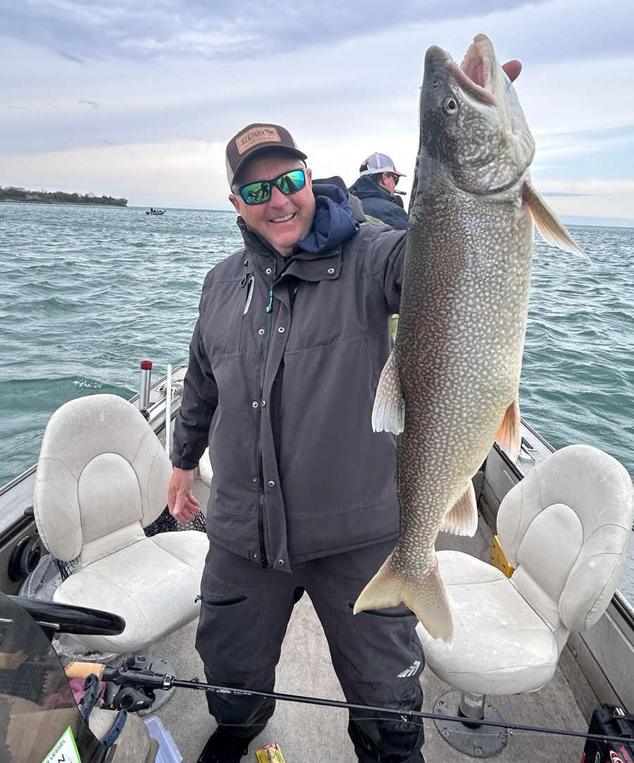 Capt. Frank Campbell with big lake trout