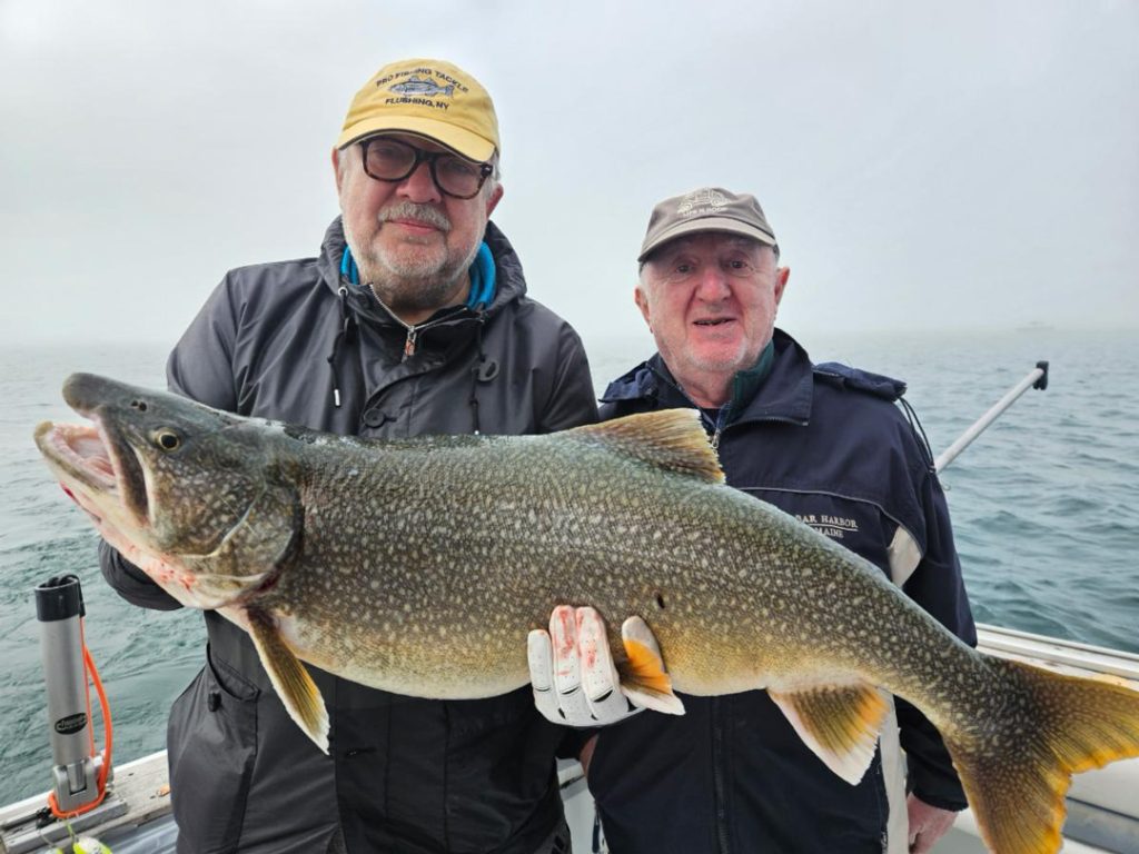 Mike and Alec with big lake trout