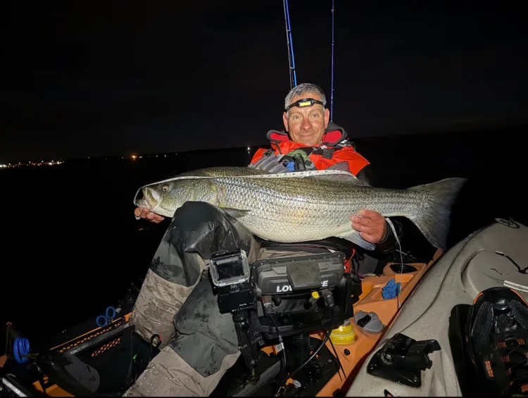 Batista with 50" striped bass