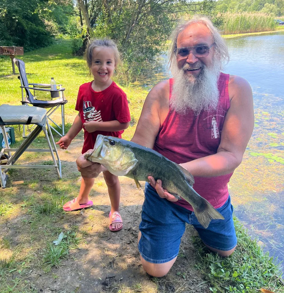 Joe Derda and Sadalynn Derda with largemouth bass