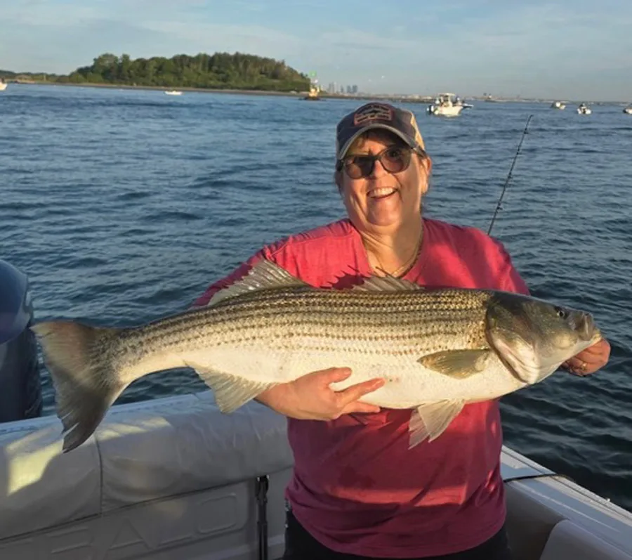 Lisa Dean with striped bass