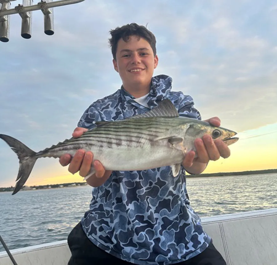 Chance with bonito aboard the Little Sister