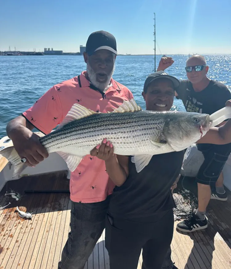 The Branch family with striped bass