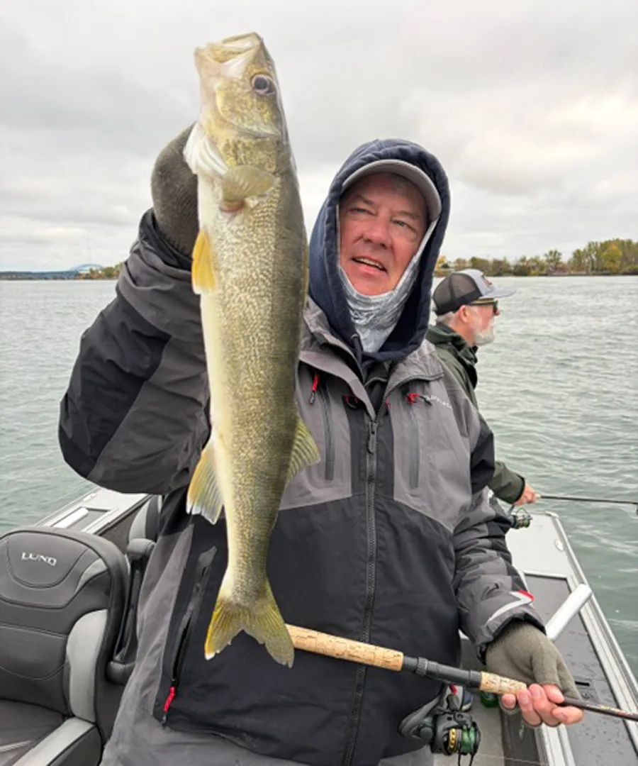 Eric Naig with walleye