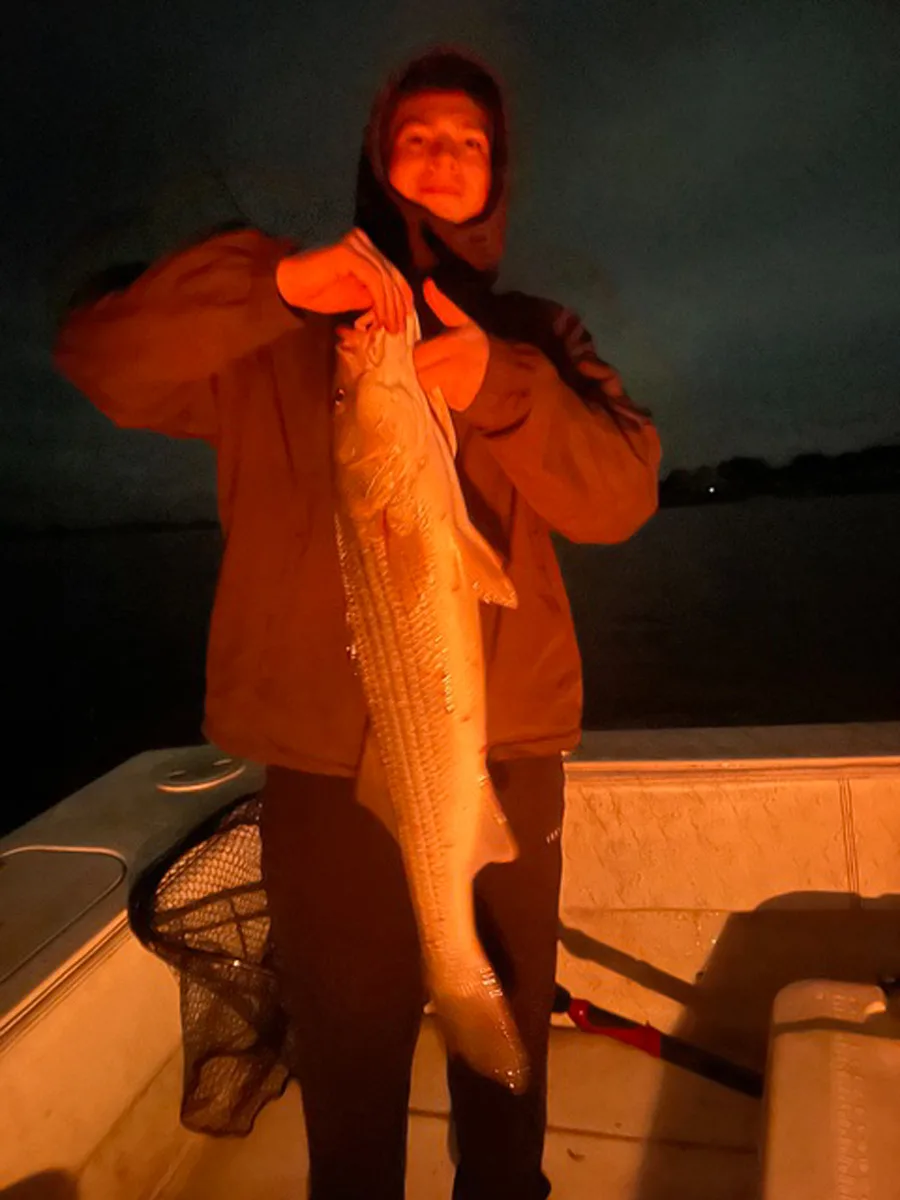Shay with a Westport River slot striper